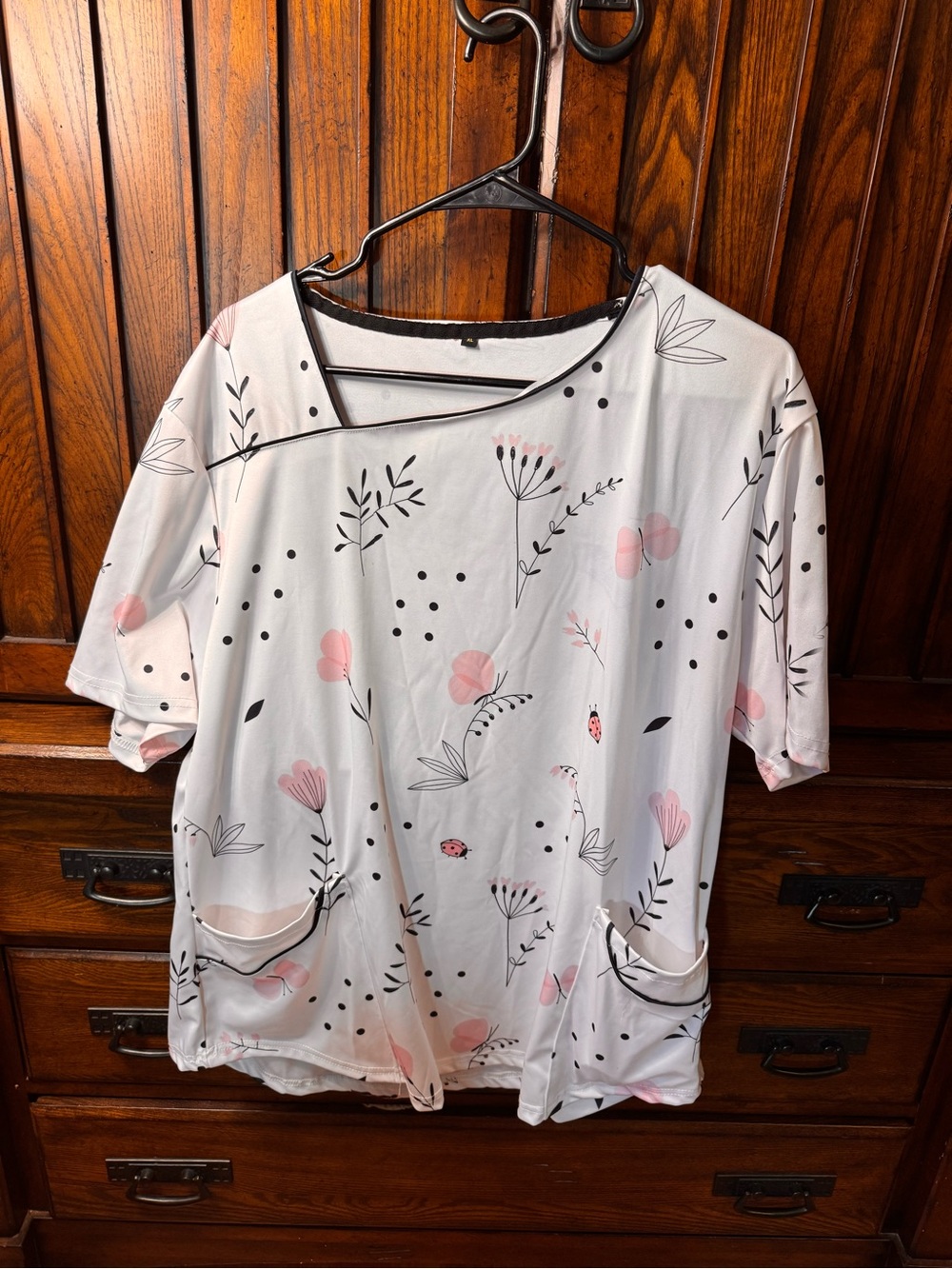 Women’s White Floral Short-Sleeve scrub top with Pink Accents